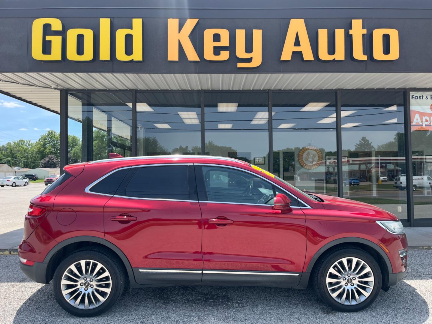 2015 Ruby Red Met Tinted CC Lincoln MKC AWD (5LMCJ2A92FU) with an 2.0L L4 DOHC 16V engine, 6-Speed Automatic transmission, located at 1633 W Kimberly, Davenport, IA, 52806, (563) 323-5341, 41.559456, -90.598732 - Photo#0